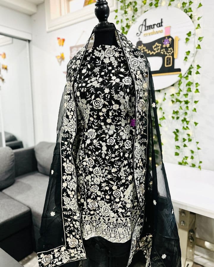 Black suit on display